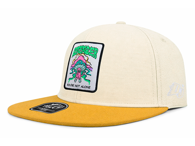Gorra plana DJ Remember you´re not alone beige/amarillo